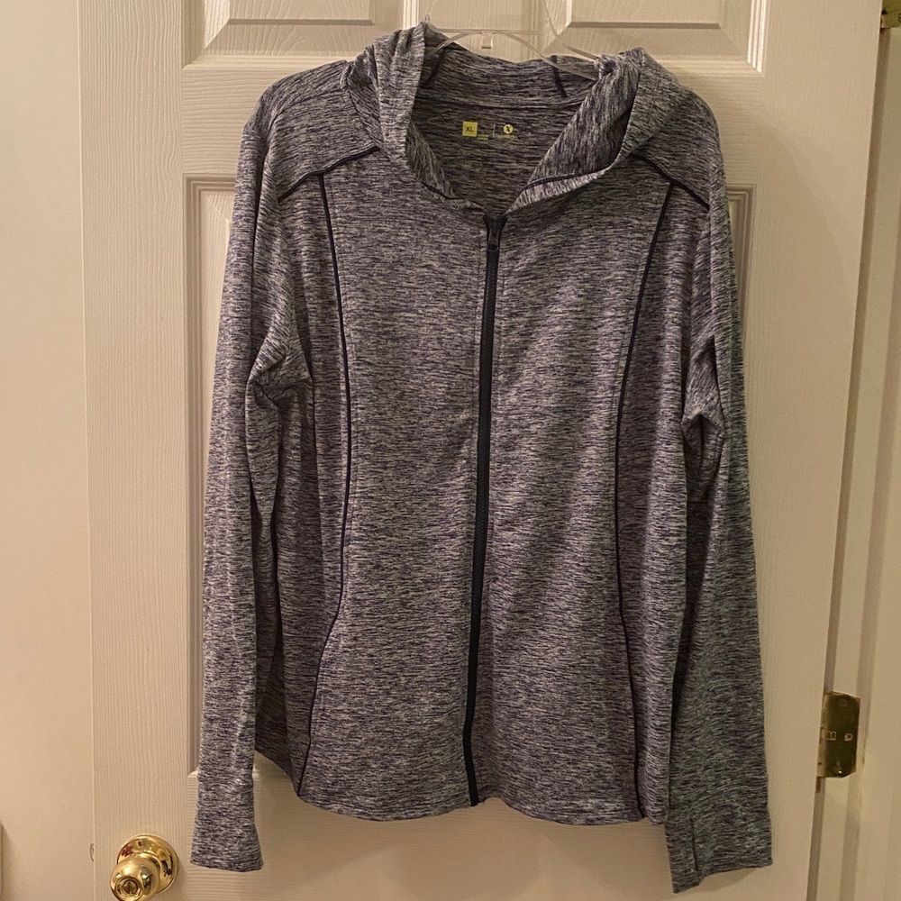 Xersion Zip up hoodie with thumb holes.